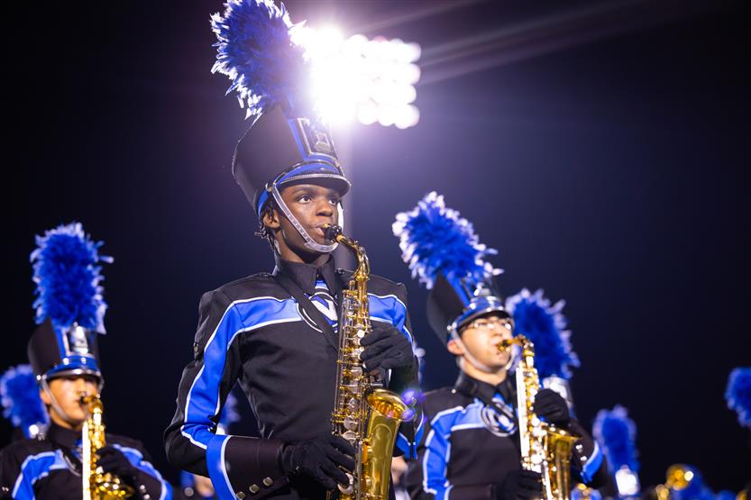 Students perform on football field